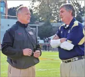  ?? Ted Mayer ?? Georgia Bulldogs head coach Mark Richt meets with Georgia Tech Yellow Jackets head coach Paul Johnson before the game. Photo by Ted Mayer