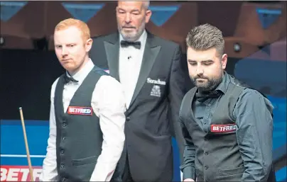  ??  ?? It was an illtempere­d encounter between Anthony McGill and Jamie Clarke