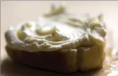  ??  ?? A smear of clotted cream on a maple-cardamom saffron sticky bun.