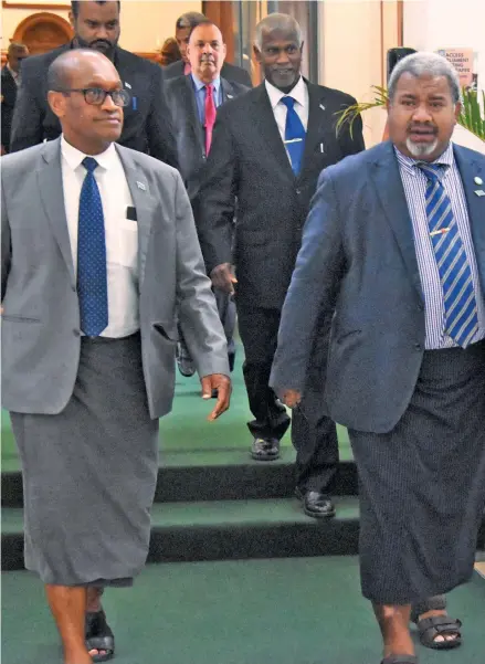  ?? Photo: Parliament of Fiji ?? Front from left: Minister for Infrastruc­ture Jone Usamate, Opposition Member of Parliament Jese Saukuru with other MP’s after the Parliament session on May 11, 2022.