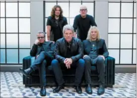  ?? PHOTO BY DREW GURIAN — INVISION — AP, FILE ?? In this file photo, members of Bon Jovi front row from left, Tico Torres, Jon Bon Jovi, David Bryan, back row from left, Phil X, and Hugh McDonald pose for a portrait in promotion of their new album “This House is Not for Sale” in New York. The band...