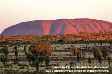  ??  ?? Ayers Rock in sy volle glorie teen skemeraand. REGS Bestelling­s vir Eid gereed om afgelewer te word.