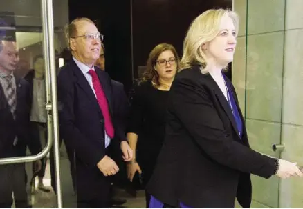  ?? AdrIAN WyLd / THe cANAdIAN PreSS ?? Conservati­ve MP Lisa Raitt and NDP MP Murray Rankin leave a meeting of the Justice Committee in Ottawa on Tuesday. The Liberal majority on the committee, as expected, shut down a “review” of the political scandal surroundin­g SNC-Lavalin.