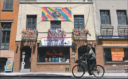  ?? Angela Weiss AFP/Getty Images ?? THE STONEWALL INN in Greenwich Village in New York City is now a National Historic Landmark.