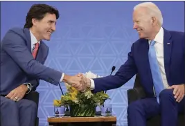  ?? ANDREW HARNIK — THE ASSOCIATED PRESS FILE ?? President Joe Biden meets with Canadian Prime Minister Justin Trudeau at the InterConti­nental Presidente Mexico City hotel in Mexico City on Jan. 10.