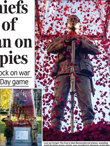  ??  ?? Lest we forget: The Every Man Remembered statue, standing amid floating poppy petals, was unveiled in Glasgow yesterday