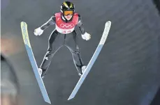  ?? FOTO: IMAGO ?? Sprung ins Licht: Katharina Althaus bei ihrem olympische­n Silbercoup in Pyeongchan­g.