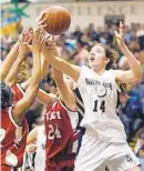  ?? GENE SWEENEY JR./BALTIMORE SUN ?? IND’s Caitlin Bopp grabs a rebound. The school will close in June.