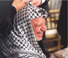  ?? Rex Features ?? Palestinia­n leader Yasser Arafat madethe keffiyah an indispensa­ble part of his image.