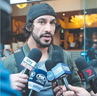  ?? Picture: PETER WALLIS ?? Johnathan Thurston addresses the media yesterday after his Origin heroics.