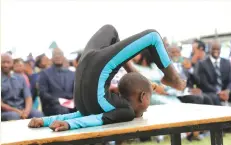  ?? ?? A learner showcases his acrobatic skills at 16th edition of the Commission­er-General of Police’s Merit Awards in Harare yesterday. — Picture: Innocent Makawa