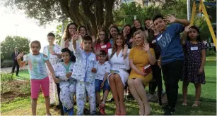  ?? (Avi Ohayon/GPO) ?? FIRST LADY Melania Trump and Sara Netanyahu, the wife of the prime minister, sit with children who are receiving treatment at Hadassah University Medical Center in Jerusalem’s Ein Kerem yesterday.