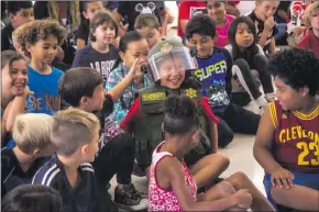  ?? Austin Dave/The
Signal ?? Students at Sulphur Springs Community School enjoyed a day with the Los Angeles County Sheriff’s Department during a special event at the school last year. The Sulphur Springs district is scheduled to draft a resolution that urges state officials to...