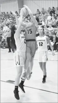  ?? Westside Eagle Observer/MIKE ECKELS ?? As Lady Lion Shylee Morrison goes up for a jumper, Lady Pioneer Ahrya Reding tipped the ball enough for Morrison to lose her grip during the third quarter of the Gravette-Gentry conference game at the competitio­n gym in Gravette Jan. 7.