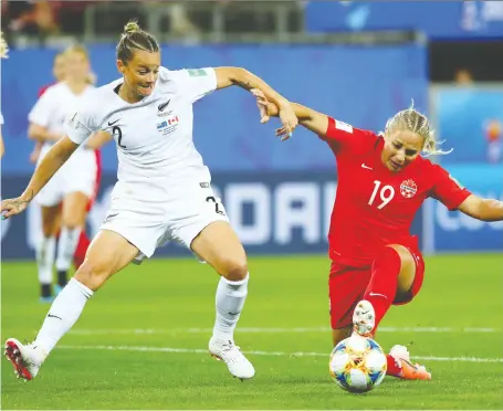  ?? DENIS BALIBOUSE/REUTERS ?? Canada’s Adriana Leon, left, dogs New Zealand’s Ria Percival during play at the World Cup last June. Leon was used predominat­ely as a substitute at the World Cup, but she exploded with four goals in Canada’s 11-0 win over St. Kitts and Nevis in an Olympic qualifier.