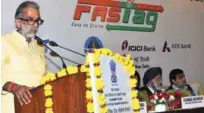  ??  ?? The Minister of State for Road Transport & Highways and Shipping, Krishan Pal, addressing at the launch of the Electronic Toll Collection (ETC) System for Delhi-Mumbai Highway. Union Minister for Road Transport & Highways, Nitin Gadkari is also seen