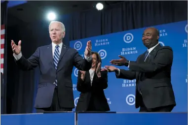  ?? PATRICK SEMANSKY/ASSOCIATED PRESS ?? President Joe Biden and Vice President Kamala Harris stand on stage with DNC chair Jaime Harrison at the Democratic National Committee winter meeting, Friday, Feb. 3, 2023, in Philadelph­ia.