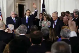  ?? DOUG MILLS — THE NEW YORK TIMES FILE PHOTO ?? President Barack Obama after signing the Affordable Care Act into law at the White House in Washington on March 23, 2010. From left: Vice President Joe Biden, Obama, Rep. Nancy Pelosi and Rep. John Dingell (D-Mich.). A set of oral histories released on Friday documents the drama of President Obama's drive to pass the Affordable Care Act.
