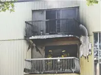  ?? Ed Kaiser ?? Firefighte­rs attend a blaze that broke out inside a third-floor apartment unit on 85 Avenue near 99 Street Wednesday.