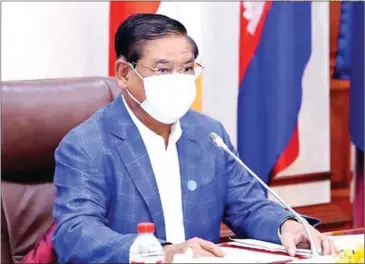  ?? AFP ?? Minister of Interior Sar Kheng said the general department will strive to promote identifica­tion work with the One Window Service, which is piloting and building a database to manage data and human resources.