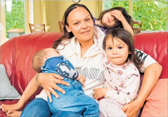  ??  ?? Donna Love with three of her seven children — Atarangi Kohe-Love, 4, Journey Kohe-Love, 3, and Taitoa Kohe-Love, 8 months. The size of the family is making it difficult to find a suitable rental.