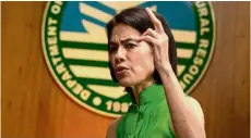  ??  ?? Going green: Lopez making a point during an interview at the DENR building in Manila. — AFP