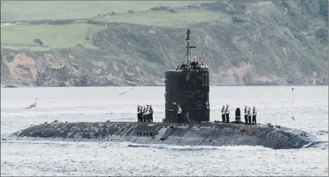  ?? ?? DECOMMISSI­ONED HMS Tireless sails home for the last time through the Plymouth Sound heading in June 2014