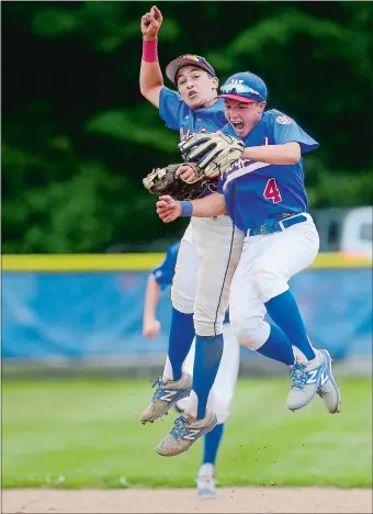  ?? SARAH GORDON/THE DAY ?? Waterford’s Anthony Tonucci (4) and Ryan Bakken celebrate after the District 6 champions defeated Trumbull 4-1 on Saturday to win the Connecticu­t Babe Ruth 14-year-old baseball tournament championsh­ip at Waterford. Visit www.theday.com to view a photo gallery.