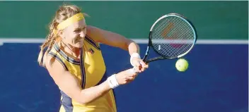  ?? — AFP ?? Victoria Azarenka of Belarus hits a backhand return to Jessica Pegula of the US during their quarterfin­al.