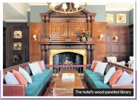  ??  ?? The hotel’s wood-panelled library