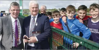  ??  ?? Cathaoirle­ach of Sligo County Council Hubert Keaney and GAA President Aogán Ó Fearghaill with U- 14 Developmen­t players at the Official Opening of the Sligo GAA Centre of Excellence at Scarden.