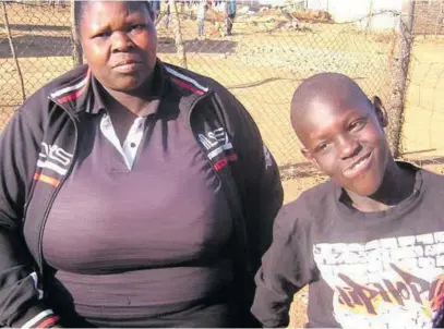  ?? Picture: ANA Health-e News ?? EDUCATIONA­L OUTCAST. Fistos Cutshwa, 12, pictured with his mum, Cynthia, has cerebral palsy and has never been to school.