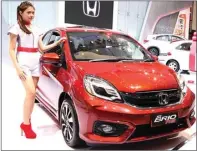  ??  ?? low cost green city car. FRIZAL/JAWA POS DOMINAN: Honda Brio saat dipamerkan di Surabaya beberapa waktu lalu.