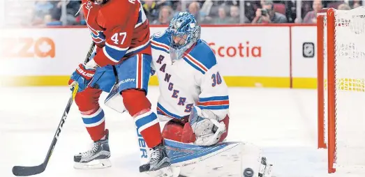  ?? USA TODAY Sports ?? THE PUCK MUST STOP HERE: Henrik Lundqvist makes a pad save on a deflection by the Canadiens’ Alexander Radulov in January. The Rangers need The King to bounce back from his worst statistica­l regular season when they start the playoffs in Montreal next...