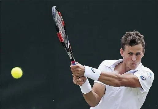  ?? JUSTIN TALLIS / AFP / Gett
y Imag
es ?? Canada’s Vasek Pospisil said he has had one prior experience at Wimbledon’s Centre Court — when he won the doubles tournament with American Jack Sock last year. Pospisil faces a tall order in the quarter-final round against Andy Murray.