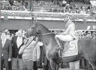  ?? AP/JOHN KEKIS ?? Joel Rosario rode Good Samaritan to a 4¾-length victory over Giuseppe the Great to spoil a matchup between the winners of the Kentucky Derby and the Preakness Stakes in Saturday’s Jim Dandy Stakes at Saratoga Race Course in New York. Derby winner...