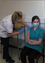  ??  ?? A member of the housekeepi­ng staff, Jessica Byrne was among the first members of staff at Wexford General Hospital to be vaccinated.