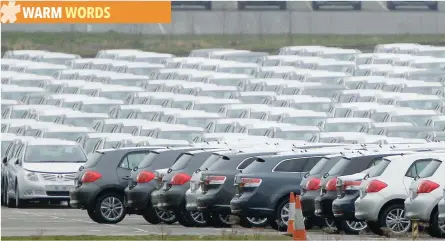  ?? — Reuters ?? New cars are parked at Toyota’s Burnaston plant near Derby, central England.