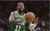  ?? CHRIS SZAGOLA/THE ASSOCIATED PRESS ?? Boston guard Kyrie Irving, traded from the Cleveland Cavaliers in the off-season, had kind words for his new city Wednesday and a not-so-subtle shot at his old NBA home.