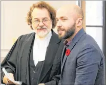  ?? TARA BRADBURY/THE TELEGRAM ?? Curtis Wasylow (right) with his lawyer, Bob Buckingham, minutes after he was declared not guilty of marijuana traffickin­g in Newfoundla­nd and Labrador Supreme Court in St. John’s Tuesday.