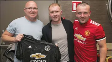  ??  ?? Eddie Roche and Pascal O’Reilly meeting Paul Scholes on Wicklow in aid of the Wicklow Hospice.