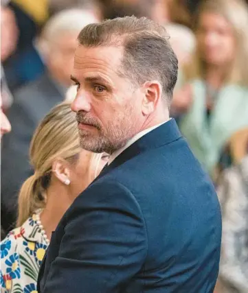  ?? HAIYUN JIANG/THE NEW YORK TIMES 2022 ?? President Joe Biden’s son Hunter attends a White House ceremony. Federal prosecutor­s could decide soon to indict him on tax and gun charges, and he faces a fresh round of hostile congressio­nal hearings.