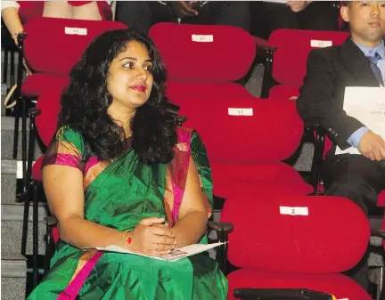  ?? BRUCE DEACHMAN ?? Deepa Varghese at her Canadian citizenshi­p ceremony at the National Arts Centre on Canada Day.