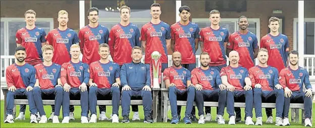  ?? Picture: Barry Goodwin (55738937) ?? Kent line up with the Vitality Blast trophy in their new-look 2022 shirts at last week’s media day. Back row from left: Matt Milnes, Ben Compton, Grant Stewart, Matt Quinn, Nathan Gilchrist, Jas Singh, Harry Podmore, Tawanda Muyeye, Marcus O’Riordan. Front row: Hamidullah Qadri, James Logan, Jordan Cox, Joe Denly, Matt Walker (head coach), Daniel Bell-Drummond, Jack Leaning, Darren Stevens, Alex Blake, Ollie Robinson