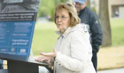  ?? ?? Portage Mayor Sue Lynch speaks Friday during a ribbon-cutting ceremony to mark improvemen­ts to Portage’s Founders Square.