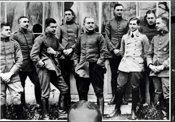  ??  ?? ABOVE: Richthofen (centre) pictured with other German officers. The Red Baron’s comrades regarded him as an approachab­le leader who was fiercely devoted to his men