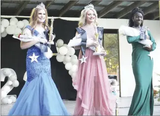  ?? ?? Zoey Leslie, left, was crowned Fairest of the Fair, Rylee Mitchell, middle, was named Teen Miss St. Francis County as well as crowd favorite, and Adrenna Carter was named first runner-up during the Teen Miss St. Francis County pageant on Wednesday.