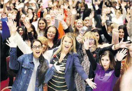  ?? PHOTOS: NICK BRANCACCIO ?? Contractor and TV host Sherry Holmes, centre, poses with approximat­ely 1,200 female students and their parents Thursday at the Build a Dream event at the Ciociaro Club. Employers from fields typically seen as dominated by men were there to network with students.