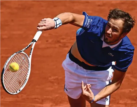  ?? AFP ?? Daniil Medvedev serves on his way to a straight-sets win over Facundo Bagnis in the French Open first round in Paris