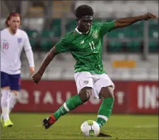  ??  ?? Festy Ebosele scoring from the penalty spot against England.